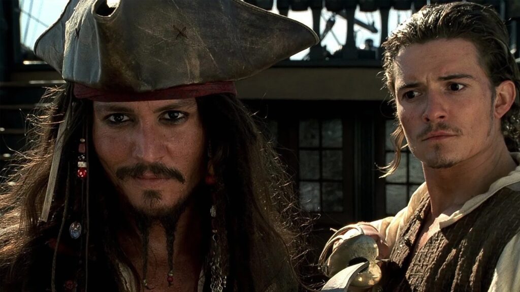 10 melhores filmes de ação dos anos 2000: lista IMDb atualizada 11 Em os 10 melhores filmes de ação dos anos 2000, O Piratas do Caribe: A Maldição do Pérola Negra com a atuação incrivel de Johnny Depp em Jack Sparrow