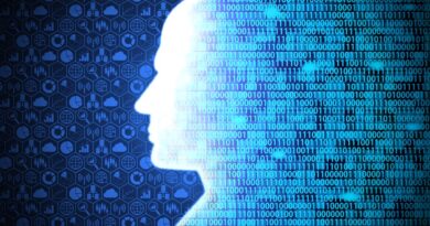 Homem observa visualização de big data, gráficos, símbolos e código binário, representando desafios em ambientes de IA. Imagem: Ariya Sontrapornpol / Getty Images