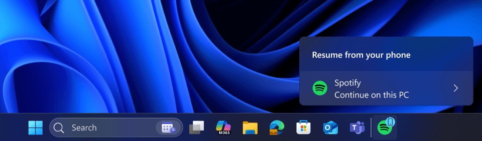 Windows 11 continuar tarefas Android: teste com Spotify 3 Windows 11 continuar tarefas Android: notificação Resume from your phone mostra Continue on this PC com ícone do Spotify na barra de tarefas