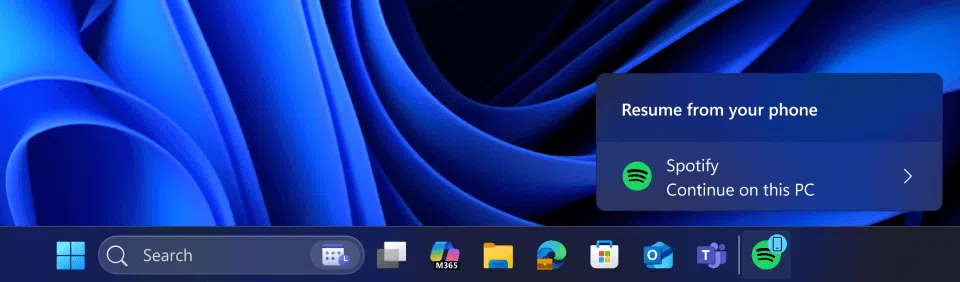Windows 11 continuar tarefas Android: teste com Spotify 3 Windows 11 continuar tarefas Android: notificação Resume from your phone mostra Continue on this PC com ícone do Spotify na barra de tarefas