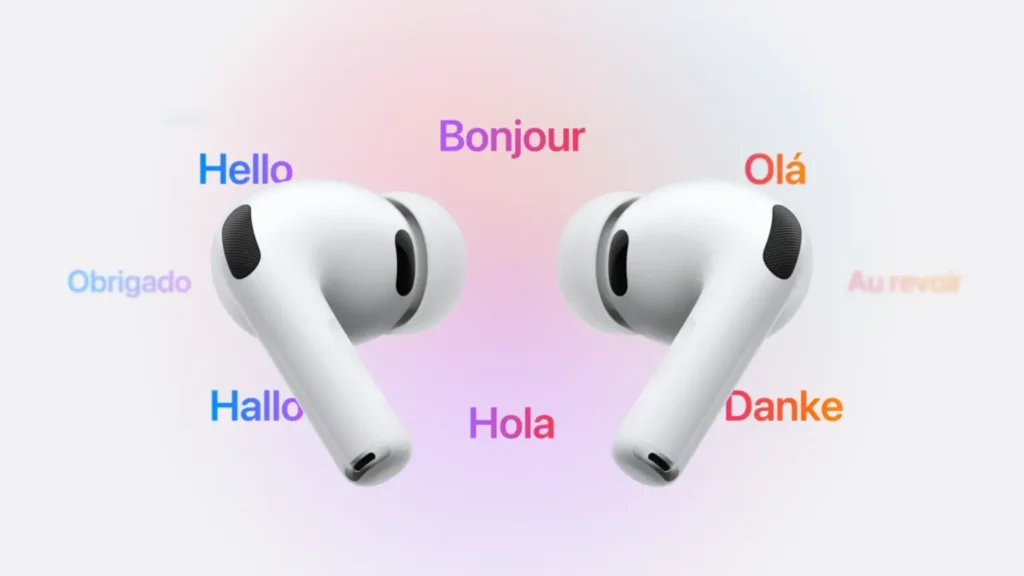AirPods Pro 3: tradução em tempo real e monitor cardíaco 4 Dois fones de ouvido brancos lado a lado, cercados por palavras em vários idiomas como Hello, Bonjour e Olá; ilustra a função de tradução dos AirPods Pro 3