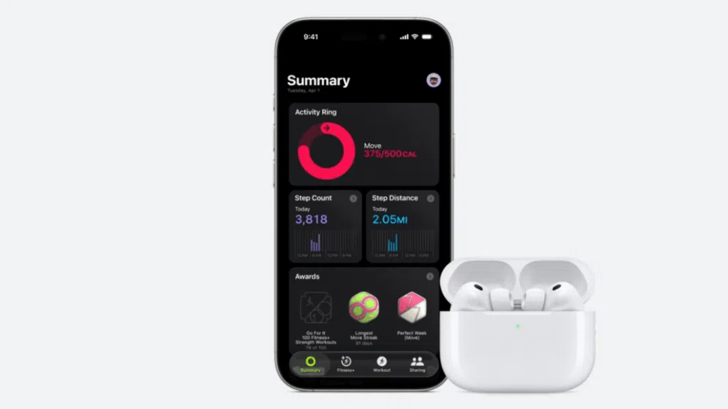 AirPods Pro 3: tradução em tempo real e monitor cardíaco 4 Dois fones de ouvido brancos lado a lado, cercados por palavras em vários idiomas como Hello, Bonjour e Olá; ilustra a função de tradução dos AirPods Pro 3