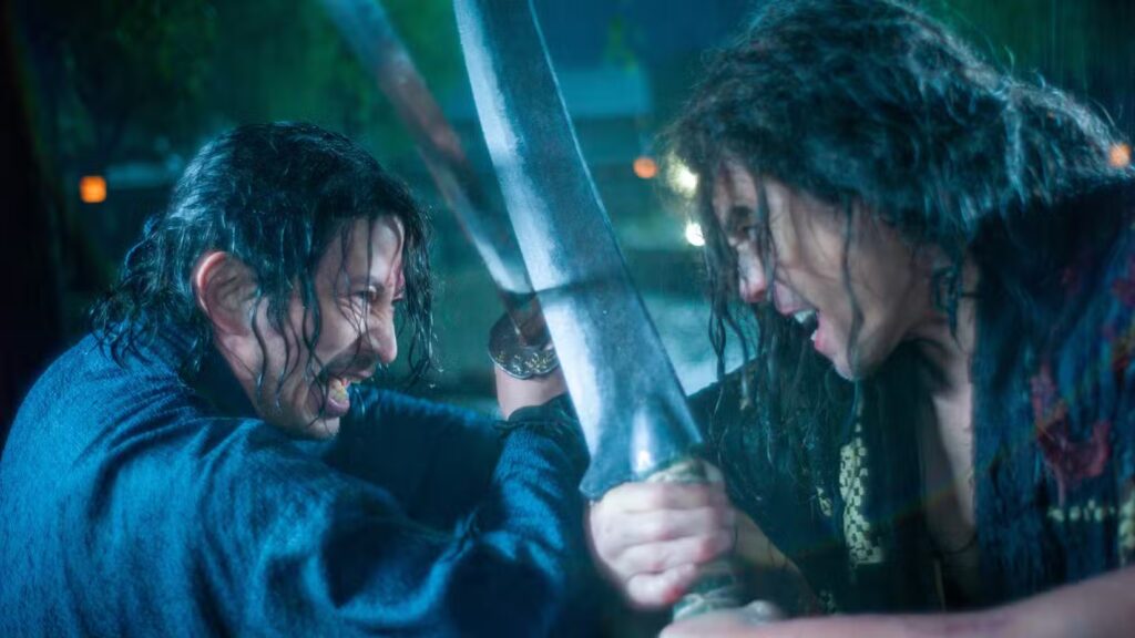 Junichi Okada enfrenta Hideaki Ito em uma luta sob a chuva