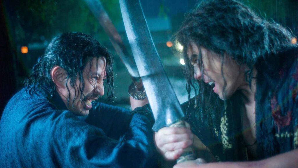 Junichi Okada enfrenta Hideaki Ito em uma luta sob a chuva