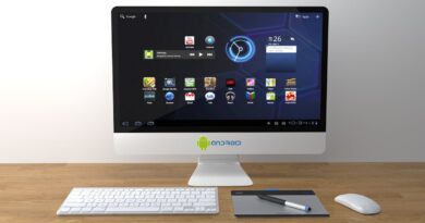 Aluminium OS: A sleek desktop setup featuring an Android interface on a monitor with keyboard and mouse.