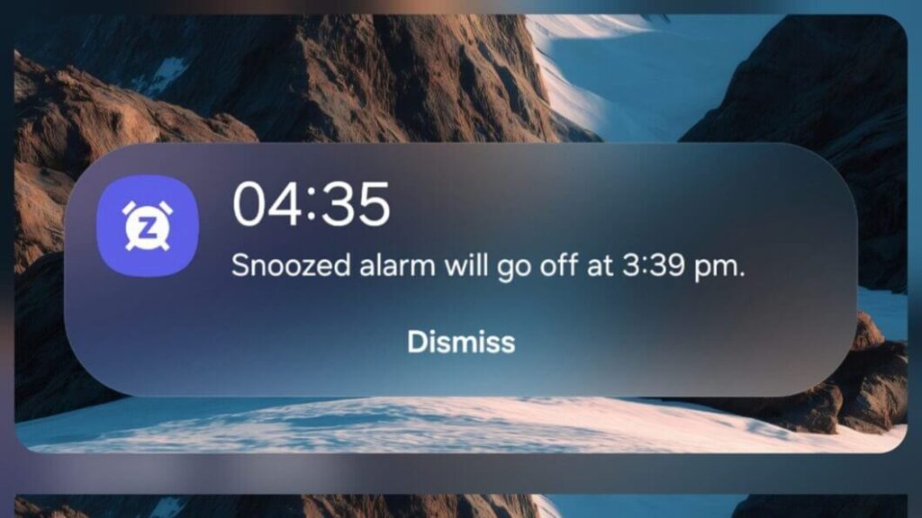 Simulação da Now Bar exibindo um widget de alarme na One UI 8.5