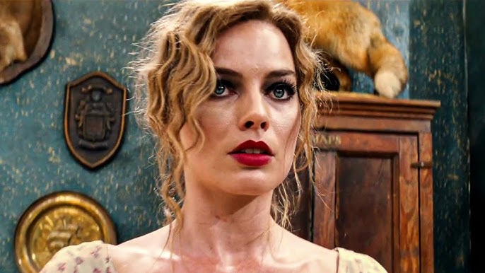 Margot Robbie em Babylon interpretando Nellie LaRoy com figurino exuberante e ousado