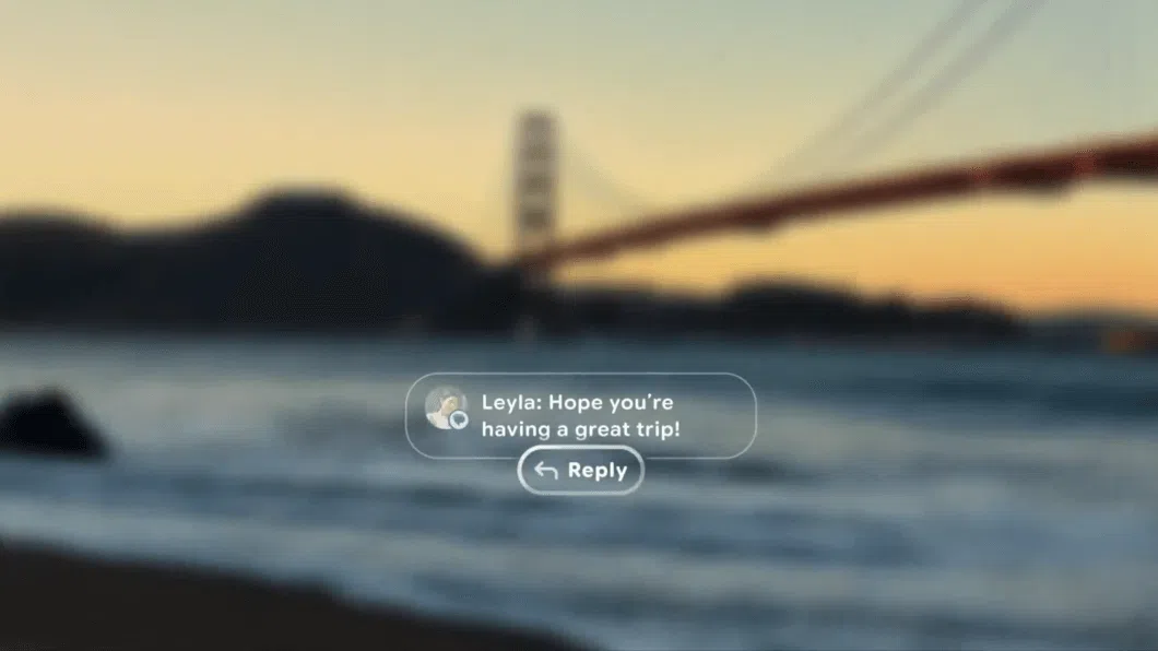 Interface translúcida dos óculos Android XR exibindo notificação flutuante e botão de resposta