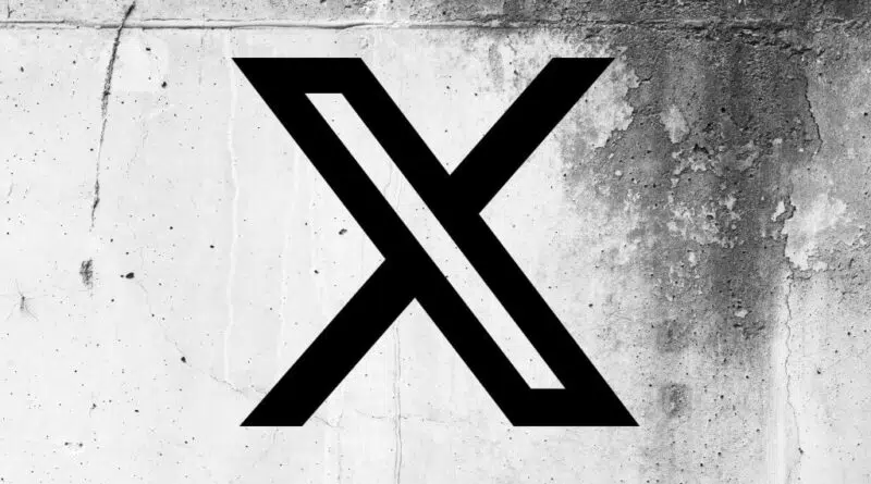 Logotipo da X (antigo Twitter) em uma parede rachada
